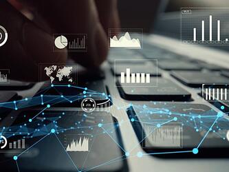 person typing on laptop